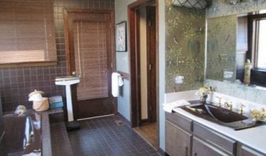 brown tile bathroom before remodel