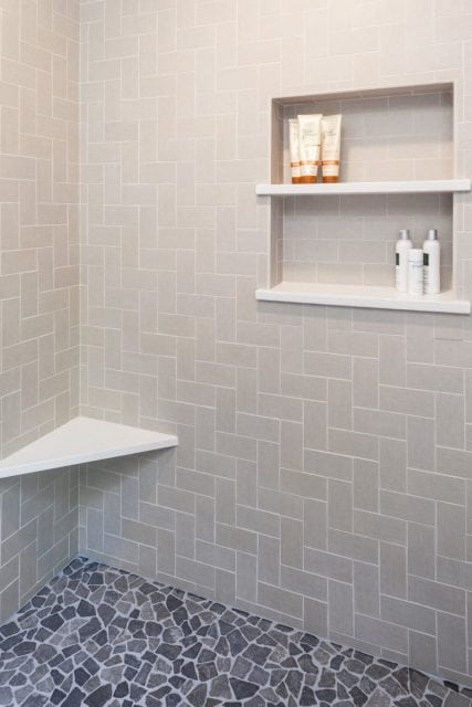 tiled shower with seat and niche