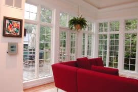 Sunroom with red couch