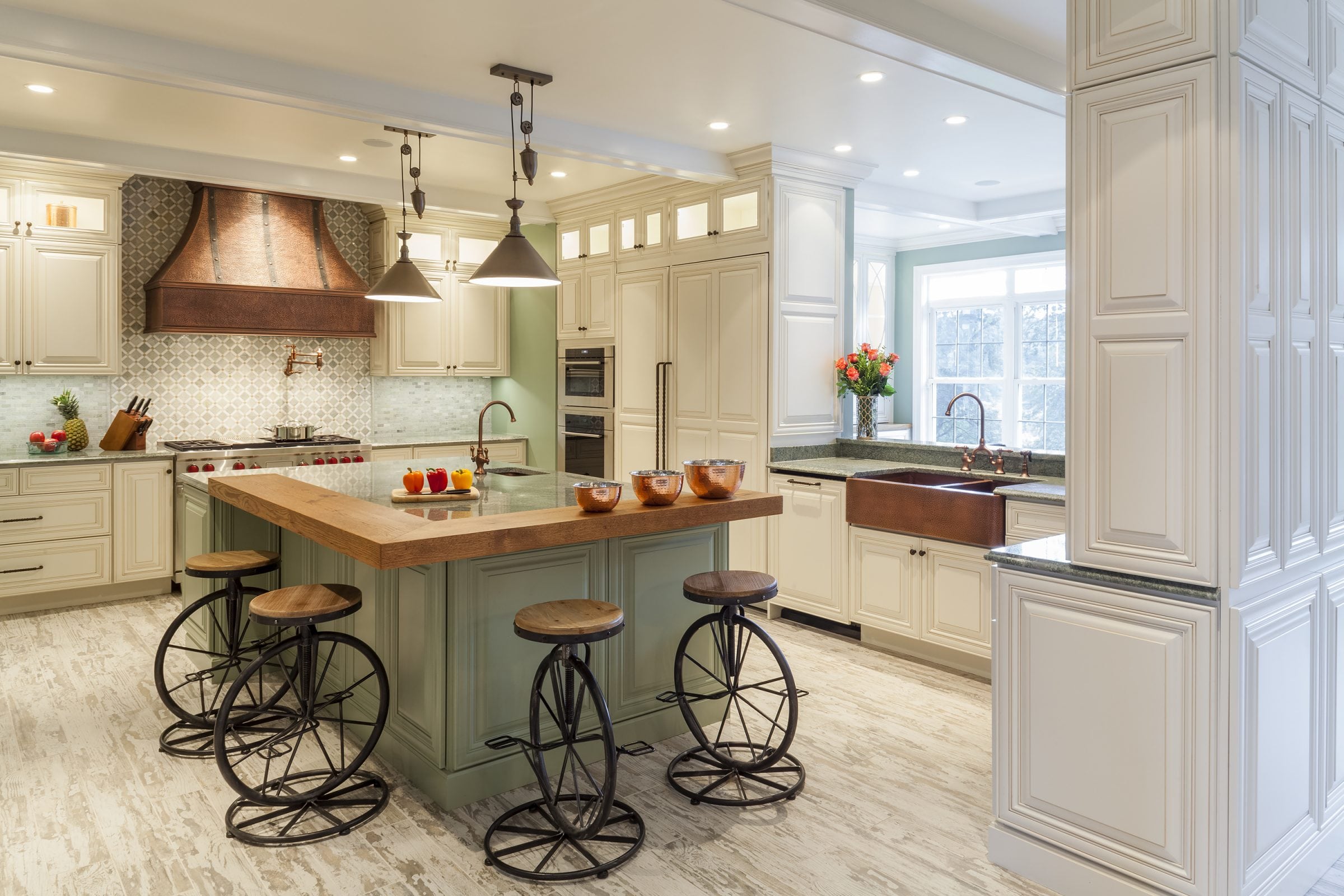remodeled kitchen with sage green kitchen cabinets