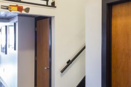 metal rails and black trim for this contemporary condo remodel