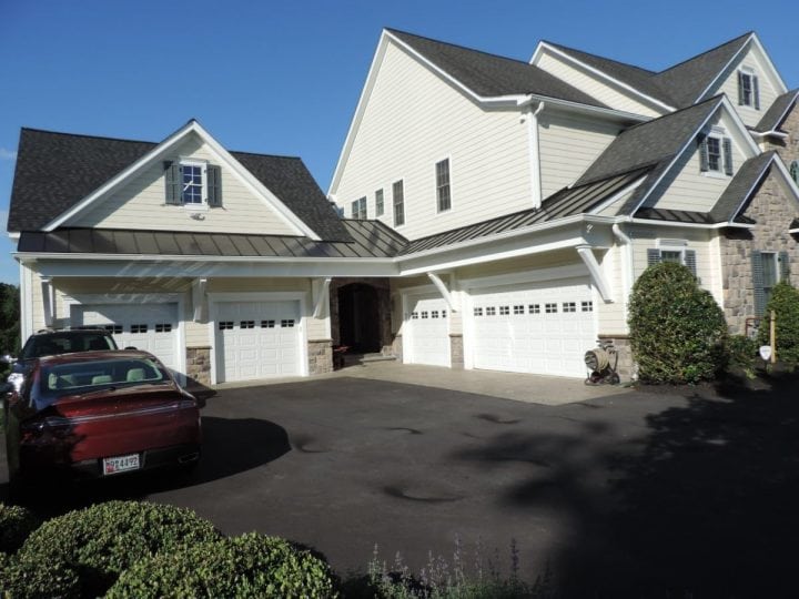 Garage addition with medieval stone breezeway