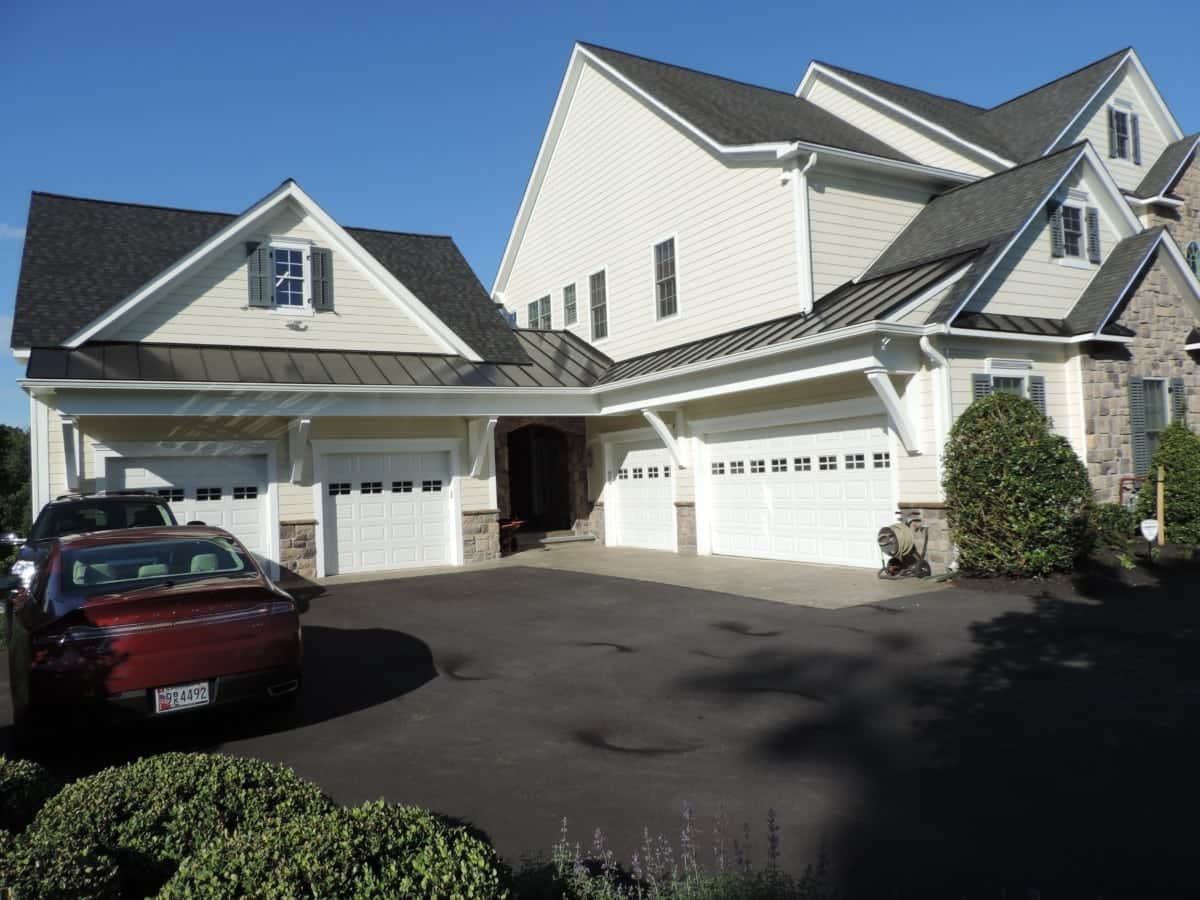 Garage addition with medieval stone breezeway. See the Project Details.