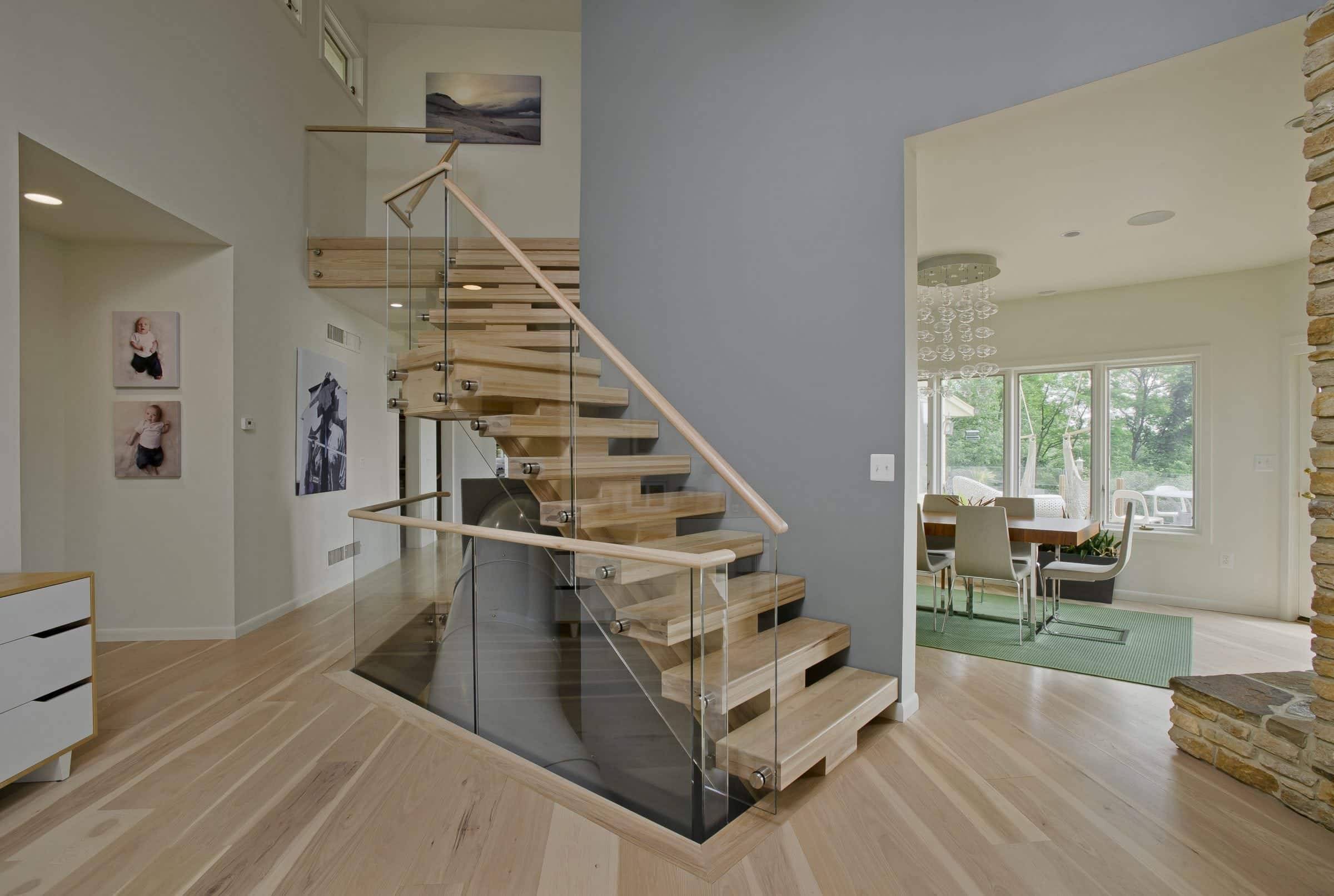 contemporary whole house renovation with floating staircase