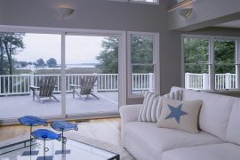 Living room with large windows and porch