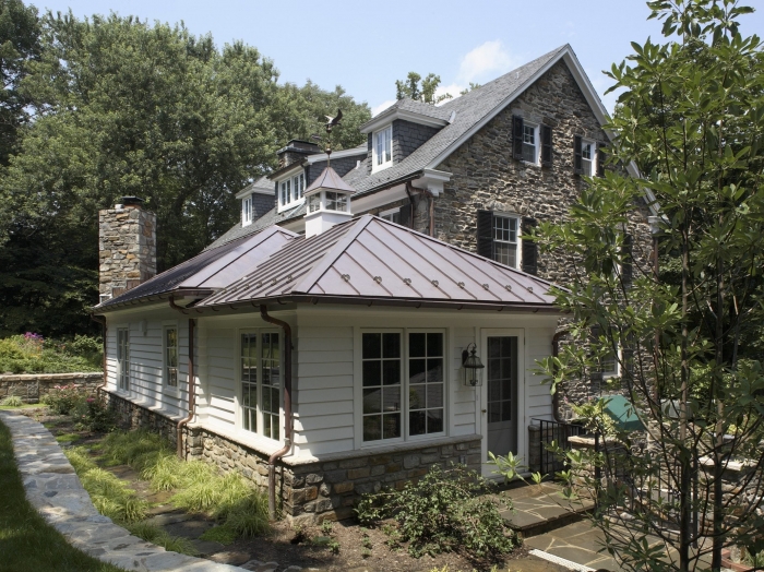 Roland Park kitchen addition with copper roof and firedplace by Owings Brothers Contracting
