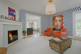 Modern living room with fireplace and pop art