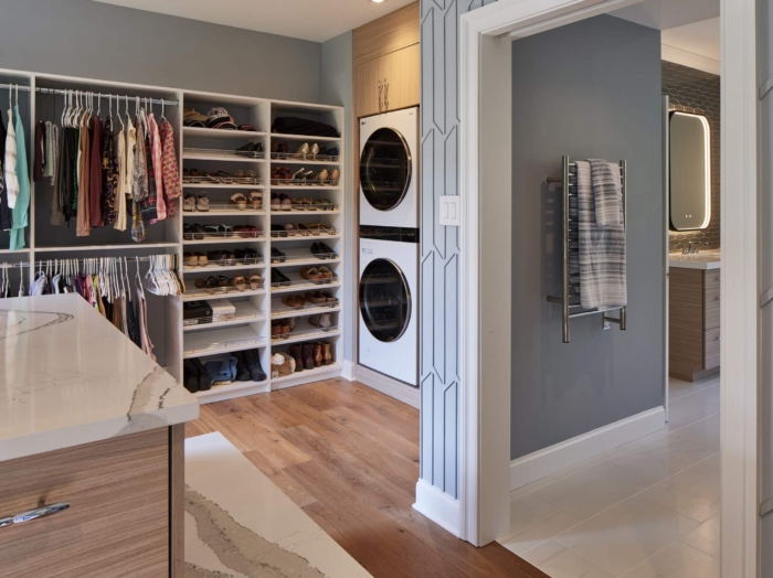Primary Closet and Laundry walk in closet and laundry off primary bathroom