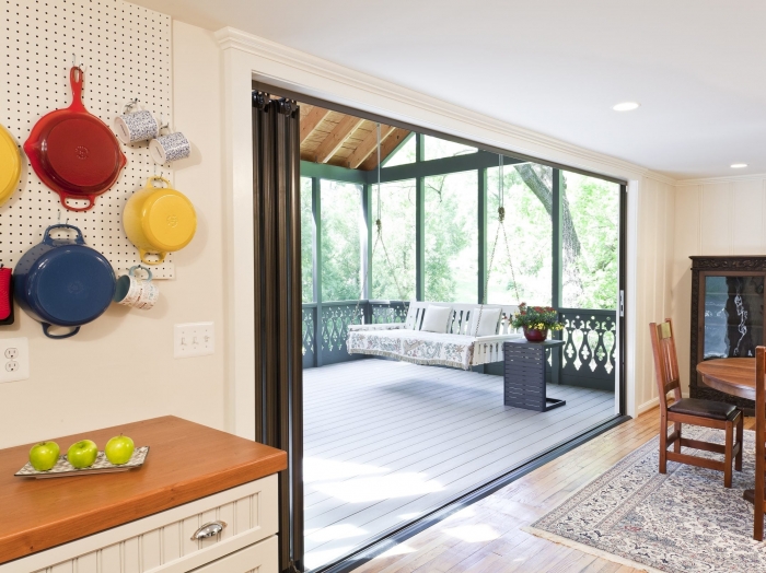 Historic Cabin remodel and sleeping porch with Nana Wall by Owings Brothers Contracting