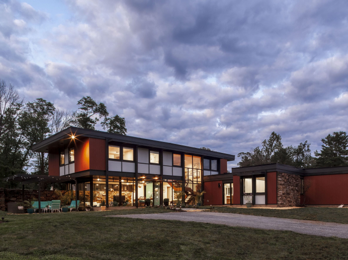 mid century modern home exterior at night
