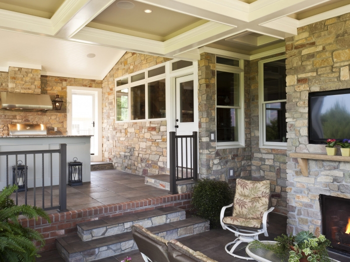 Howard County two lefel Screened Porch with kitchen and fireplace by owings brothers contracting