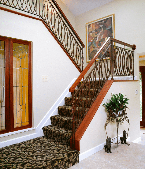 High-end home interior space with stairs.
