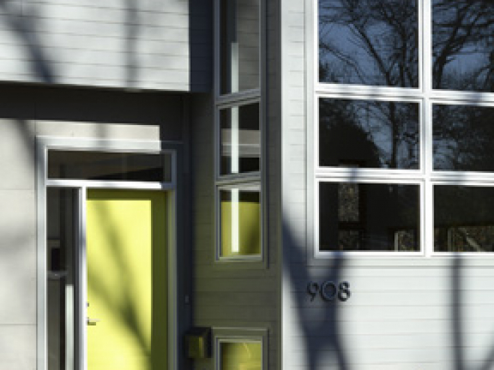 contemporary yellow door with one side light and transom