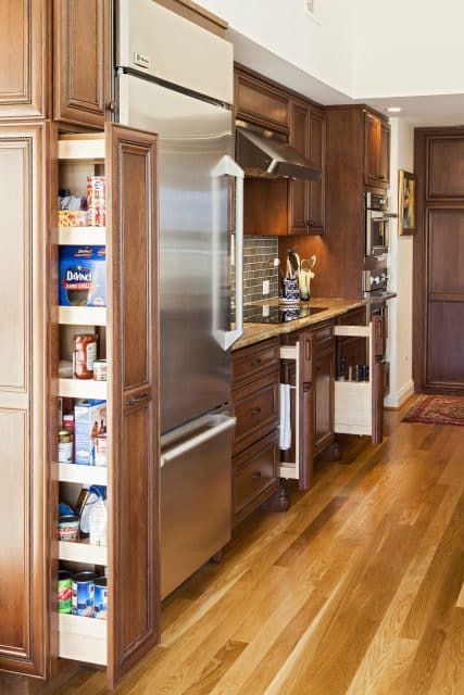 cabinet storage accessories in hi-rise condo kitchen