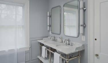 reproduction vanity with reproduction sconces