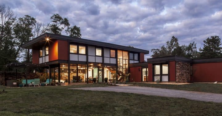 mid century modern home exterior at night