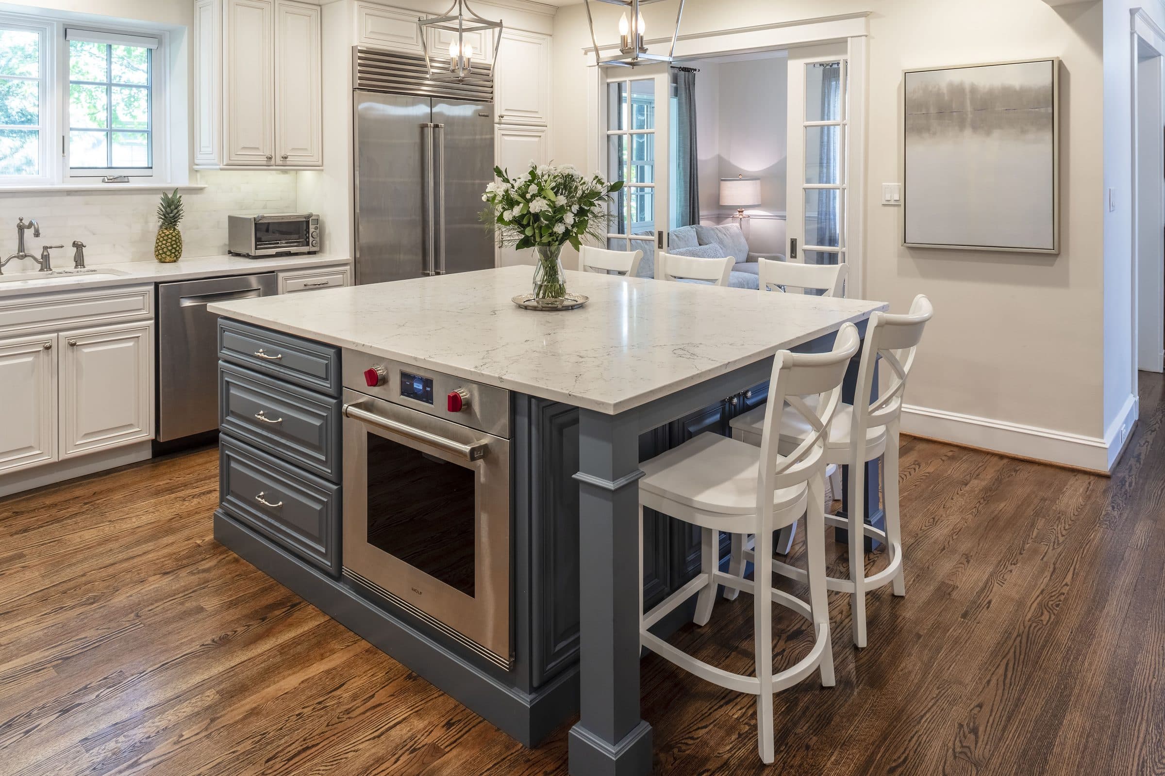 blue kitchen island with white countertop