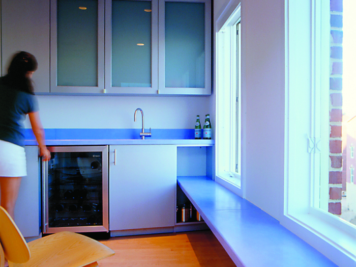 Tucked Away Behind Glass Fronts hide away bar