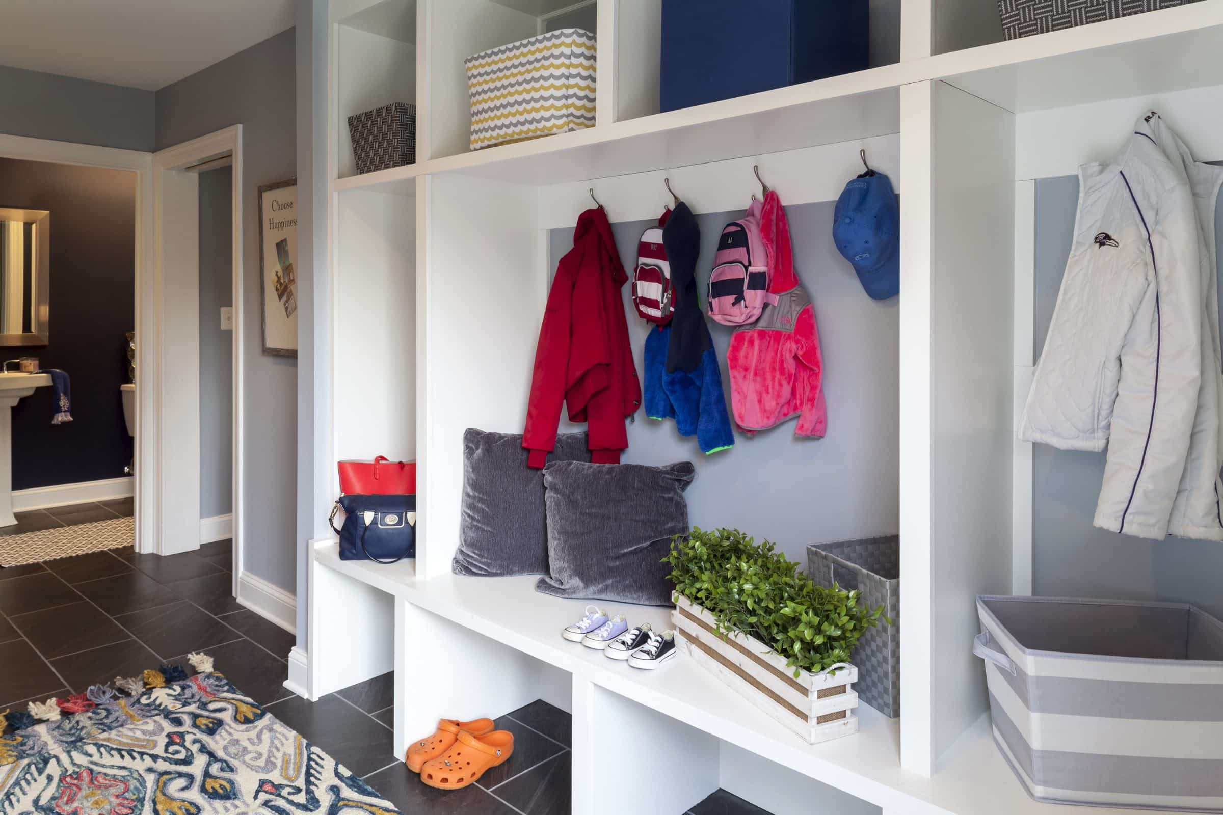 mudroom with custom cubbies organization