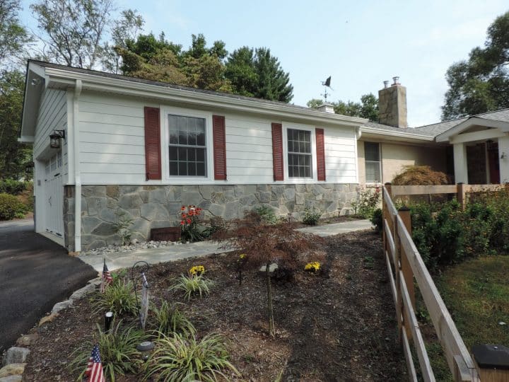Hardi Board Siding on new Garage with red shutters