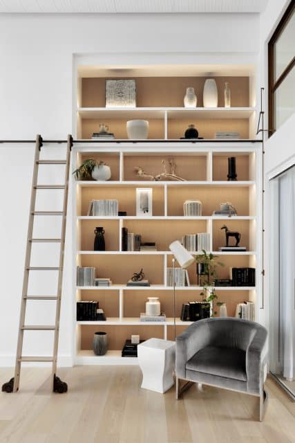 custom lighted floor to ceiling bookcase