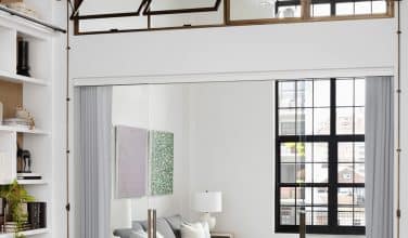 glass walled guest bedroom or den