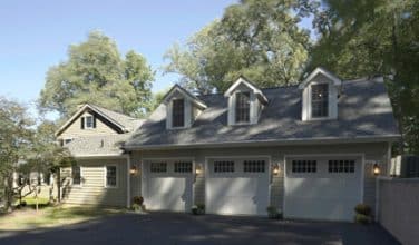 three car garage with second story