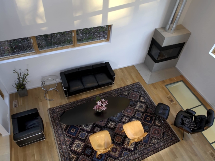living room with glass floor tiles to basement