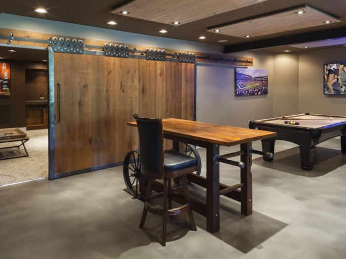 industrial style basement with pool table
