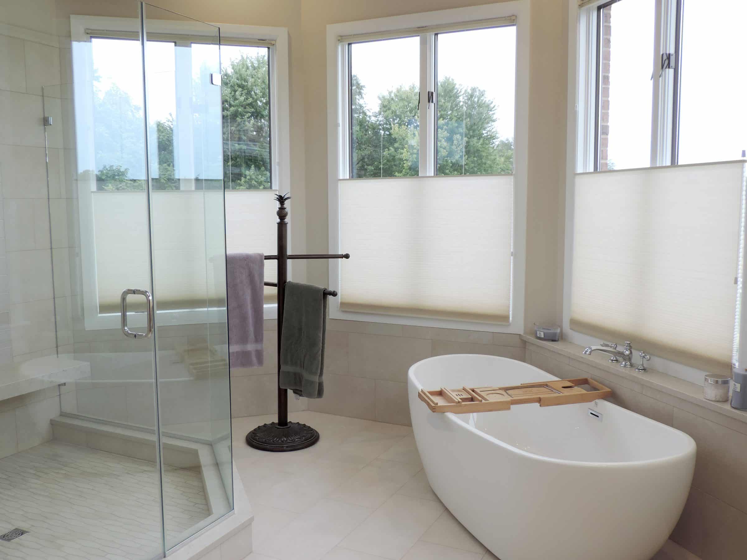 master bath with free standing tub and walk in shower