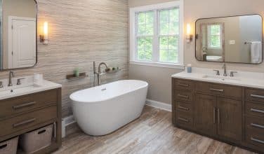 sleek freestanding soaking tub in modern master bathroom