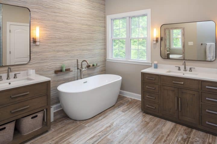 sleek freestanding soaking tub in modern master bathroom