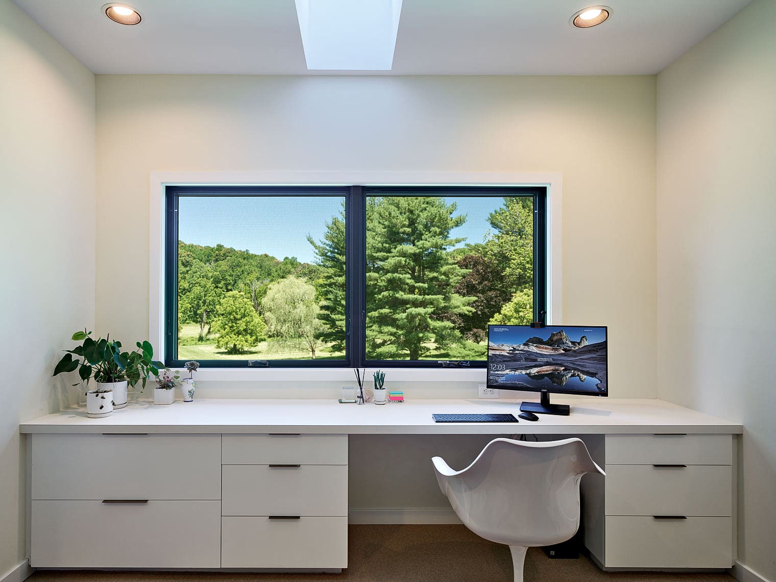 Modern home office with a pastoral view for inspiration