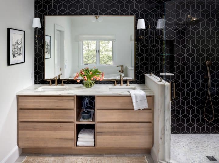 luxurious bathroom with black tile and Durasupreme double sink vanity
