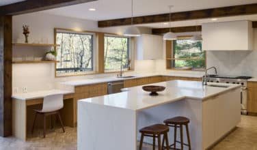 large seated island in warm wood remodeling modern style