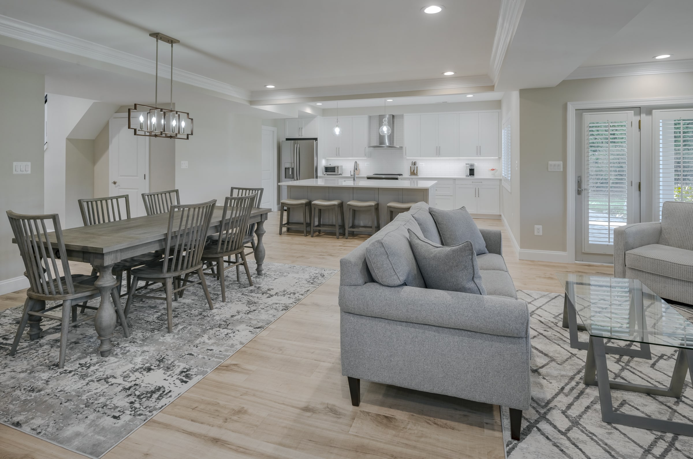 Open concept living with kitchen, dining and living areas