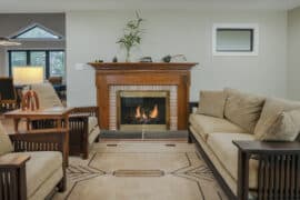 beautiful seating area with fireplace open to the corporate living spaces