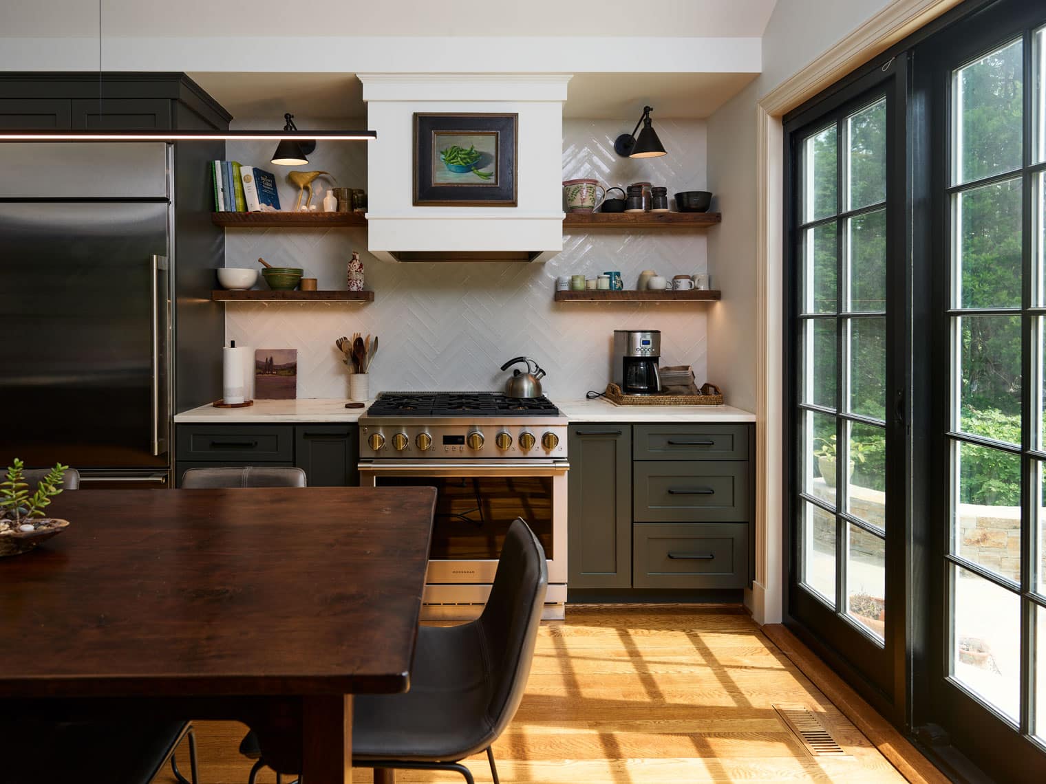 handcrafted porcelain tile in herringbone pattern backsplash