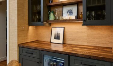 green custom painted bar cabinetry