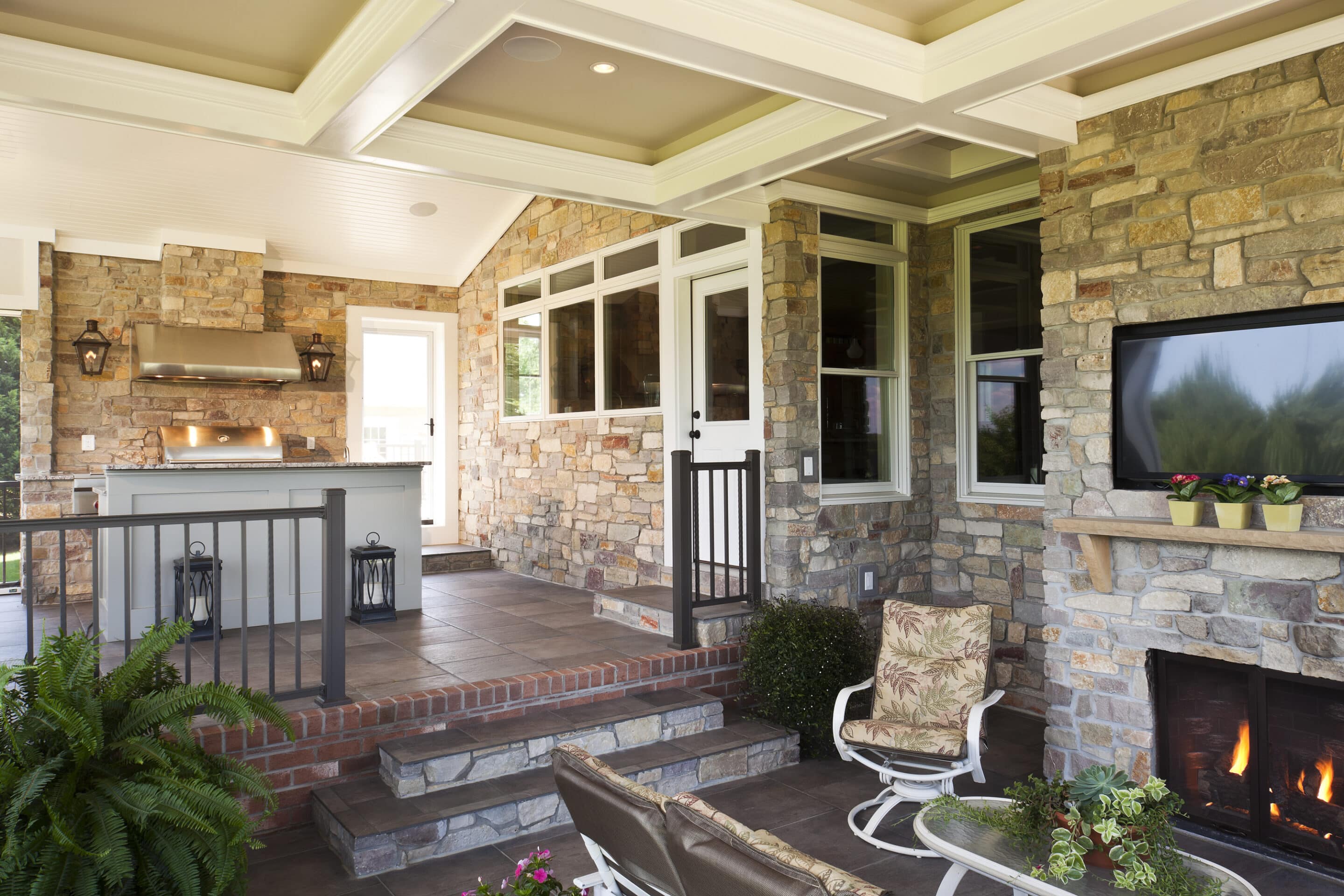 outdoor fireplace on screened porch