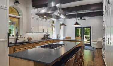 kitchen with rich luxurious touch countertops in a concrete finish black soapstone