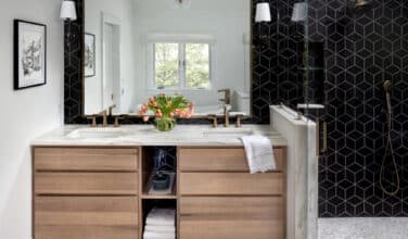 black bathroom tile, no threshold shower, double vanity