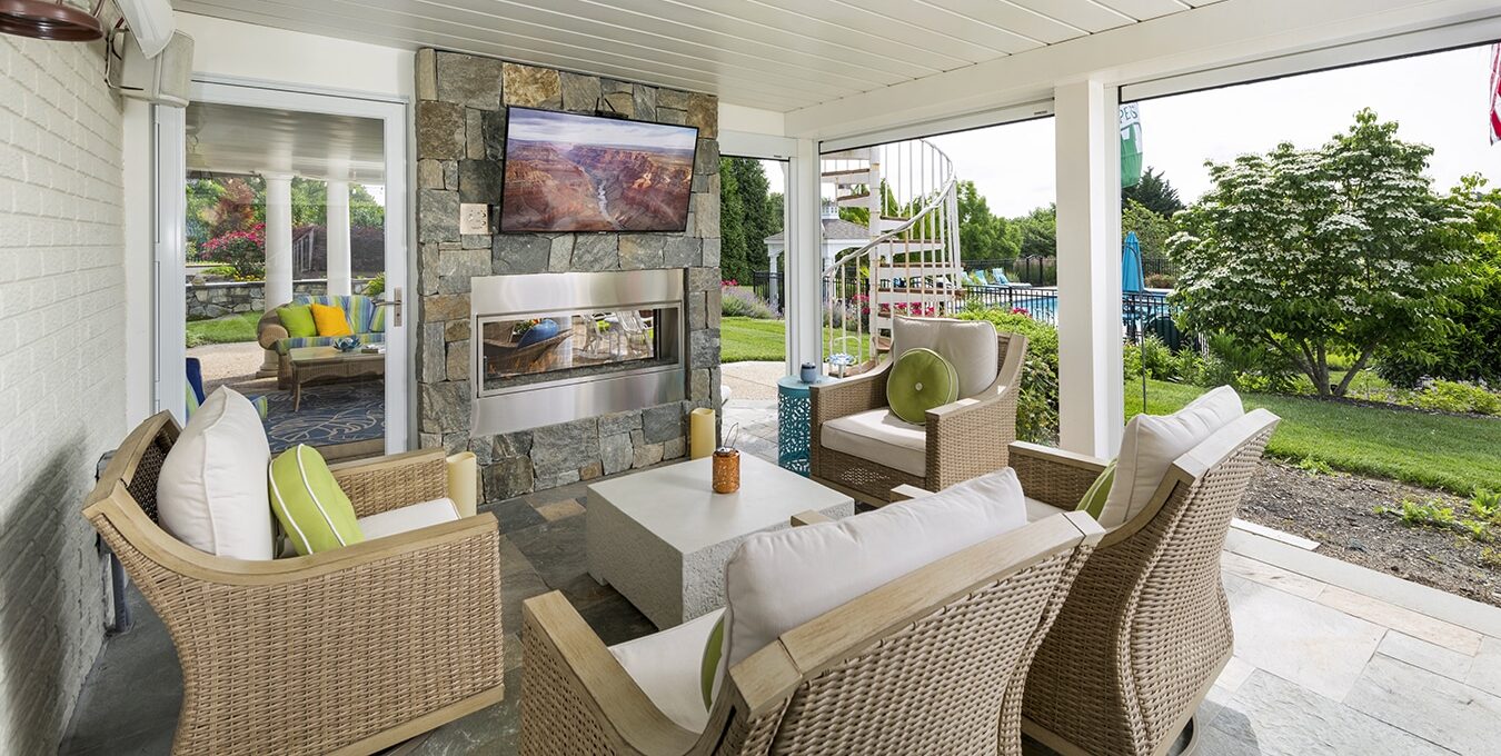 outdoor living, stone fireplace, see through fireplace, paneled ceiling