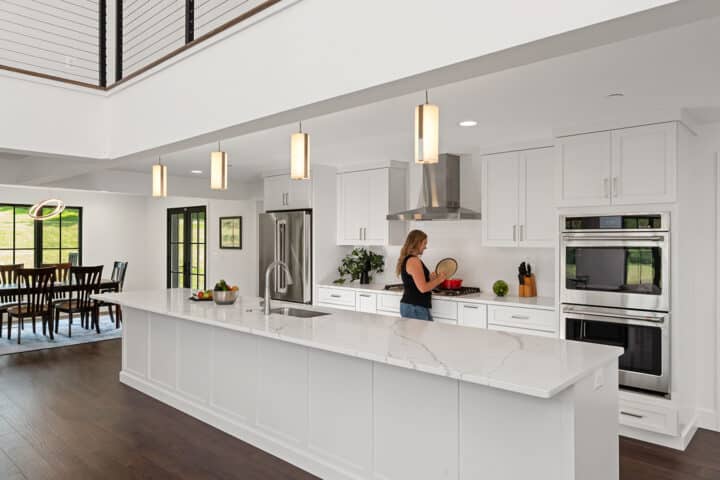 oversized kitchen island, white shaker-style cabinets, modern-style