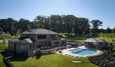luxury custom home with pool and outdoor living spaces