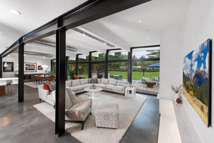 modern style, industrial style, black metal framed windows, and structural beams